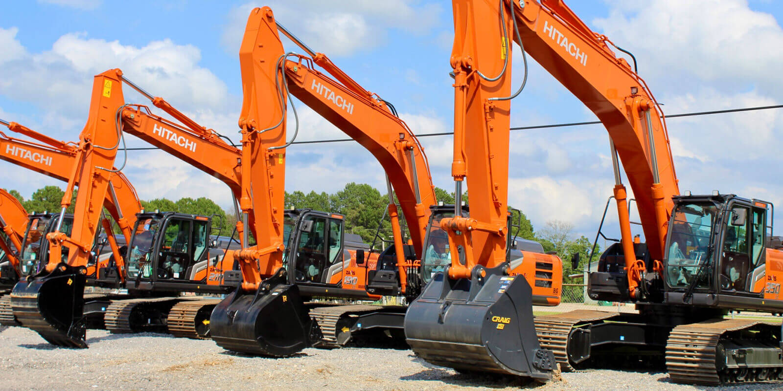Lineup of Hitachi Excavators in B & G's Equipment Yard