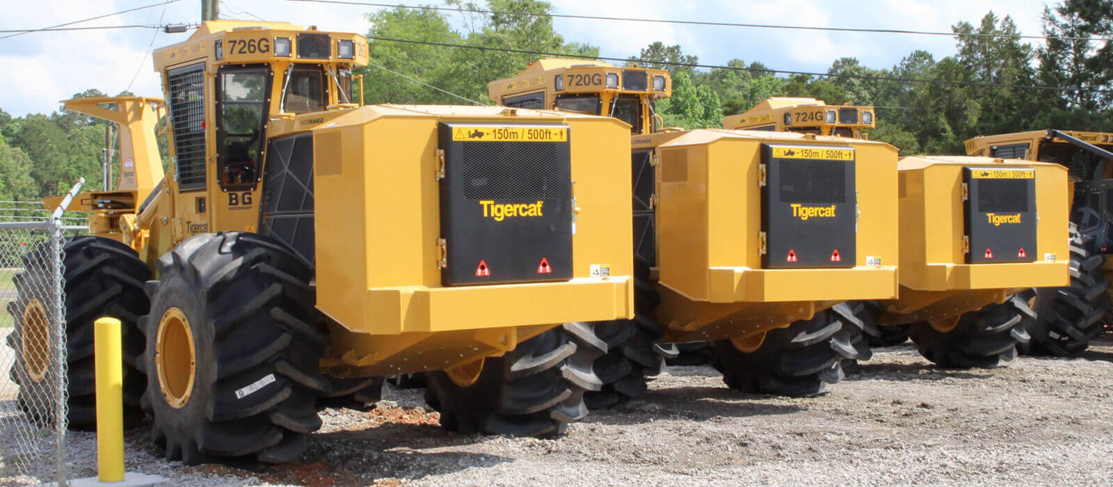 Lineup of Tigercat 726G, 720G, & 724G Feller Bunchers in B & G's Equipment Yard