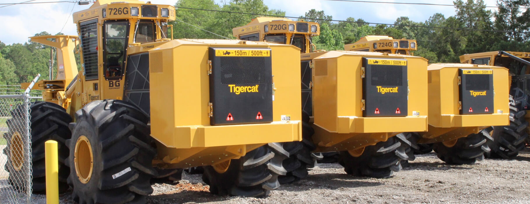 Lineup of Tigercat 726G, 720G, & 724G Feller Bunchers in B & G's Equipment Yard